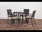 Elegant wicker dining set with table and matching outdoor chairs